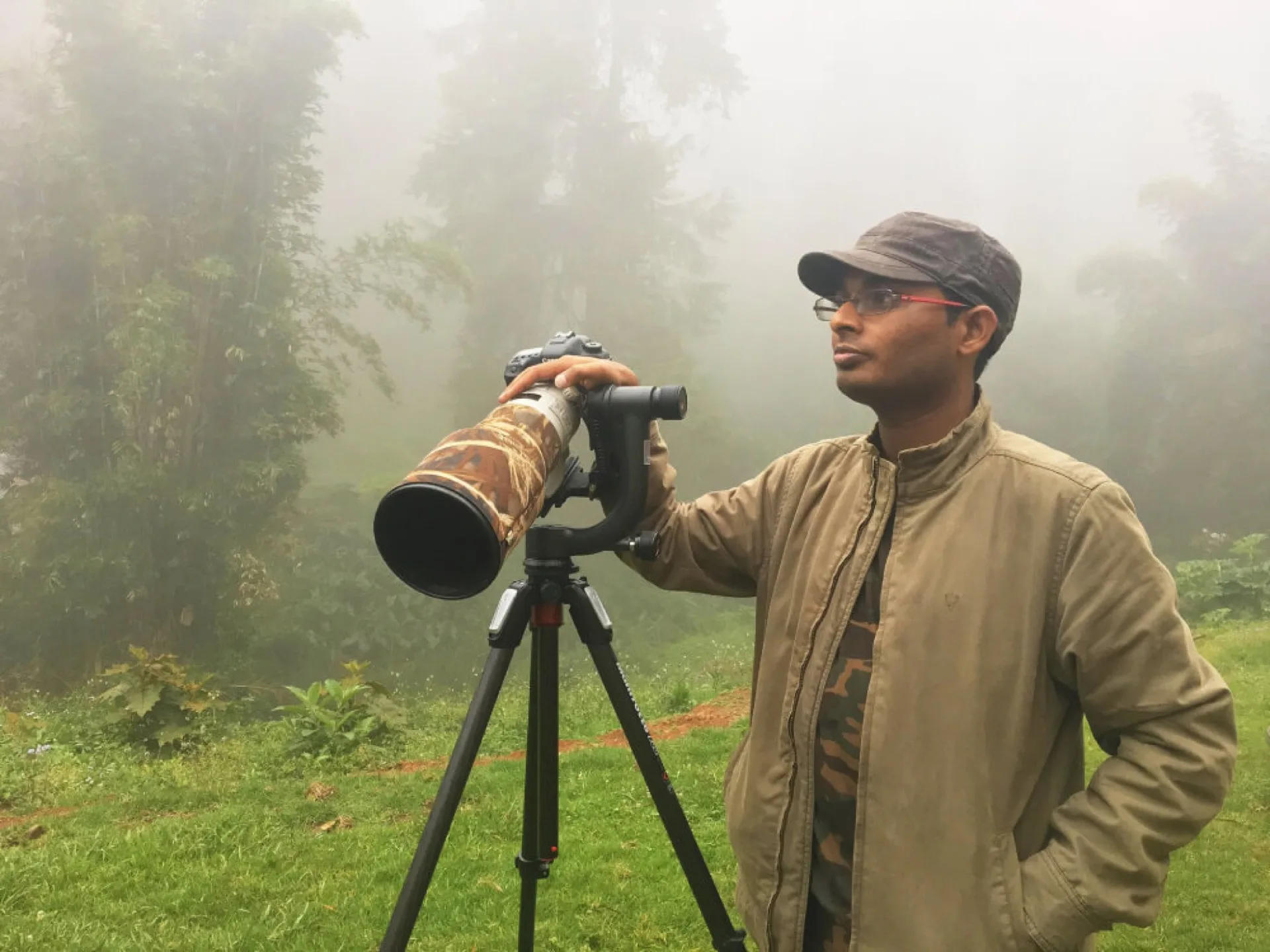 Bhargava Srivari, wildlife photographer and safari partner, shooting in misty forest